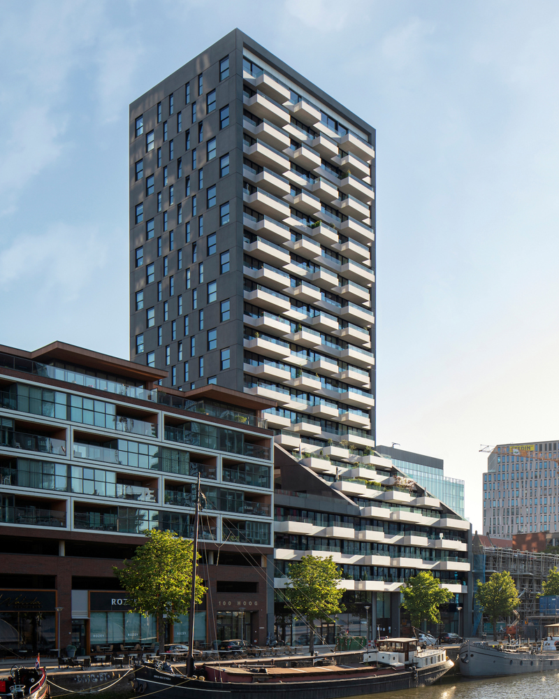Bilde av The Muse av Barcode Architects, som et velfungerende eksempel. Bilde tatt fra elven ved Wijnhaven i Rotterdam.