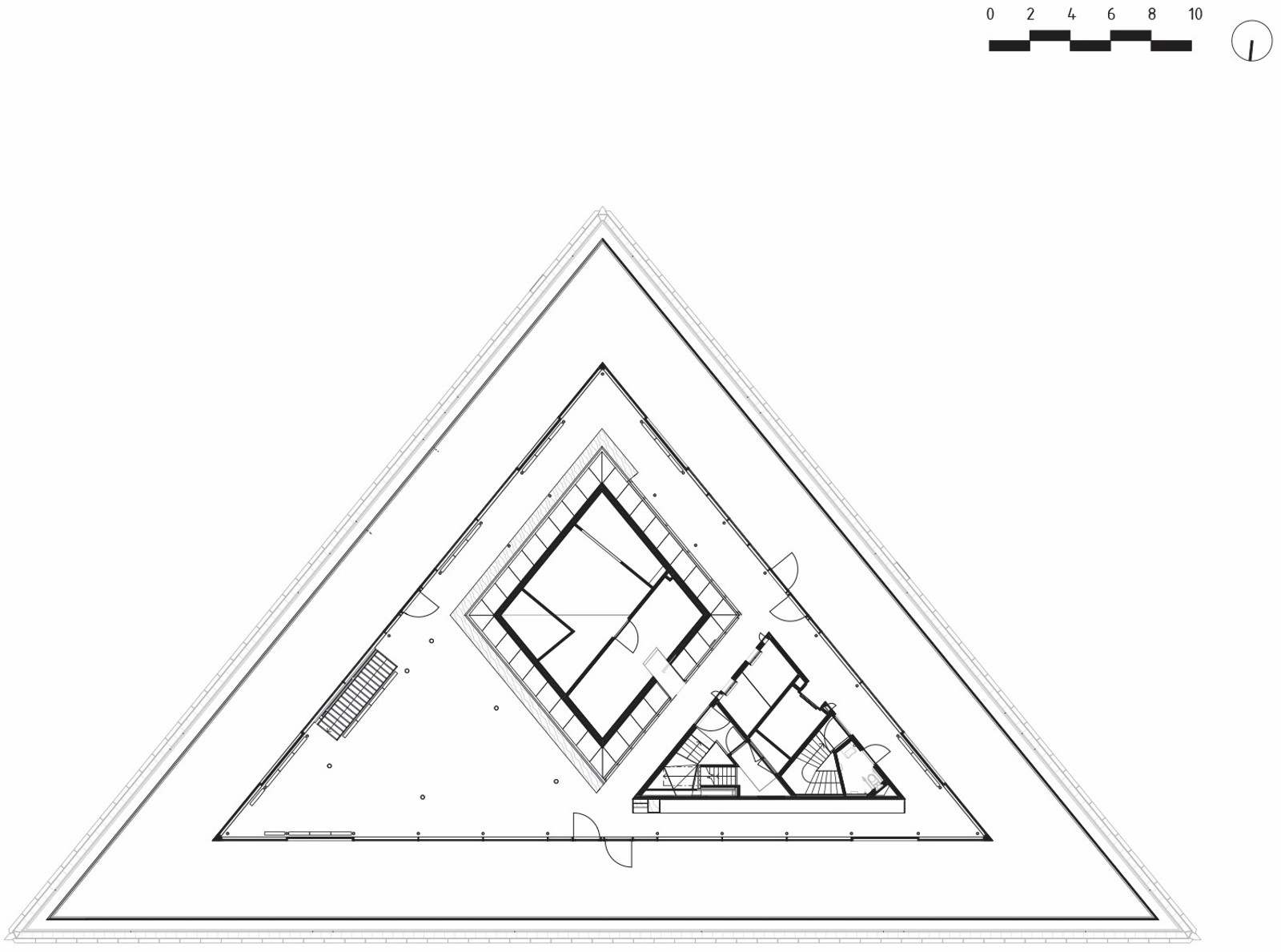 Arkitekt tegning av tredje etasje plan på et trekantet bygg.